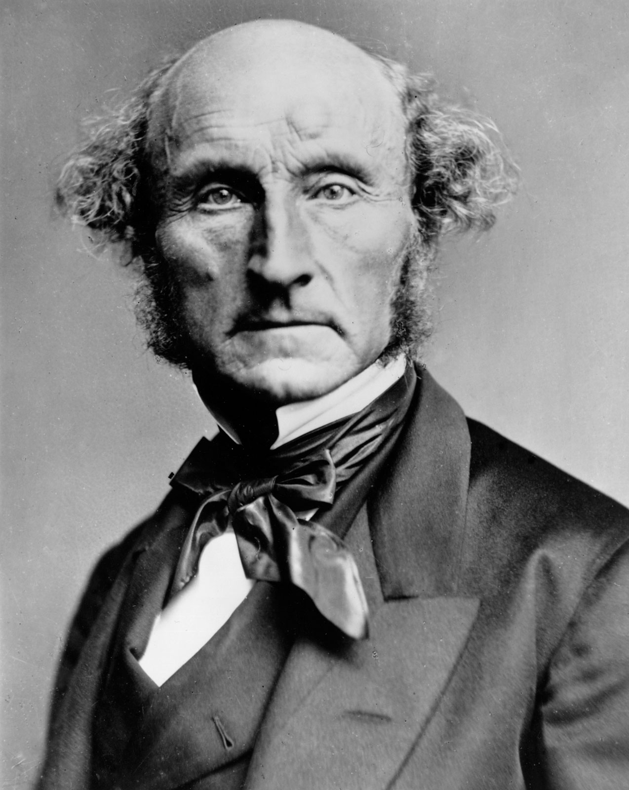 A nineteenth-century photographic portrait of the philosopher John Stuart Mill.