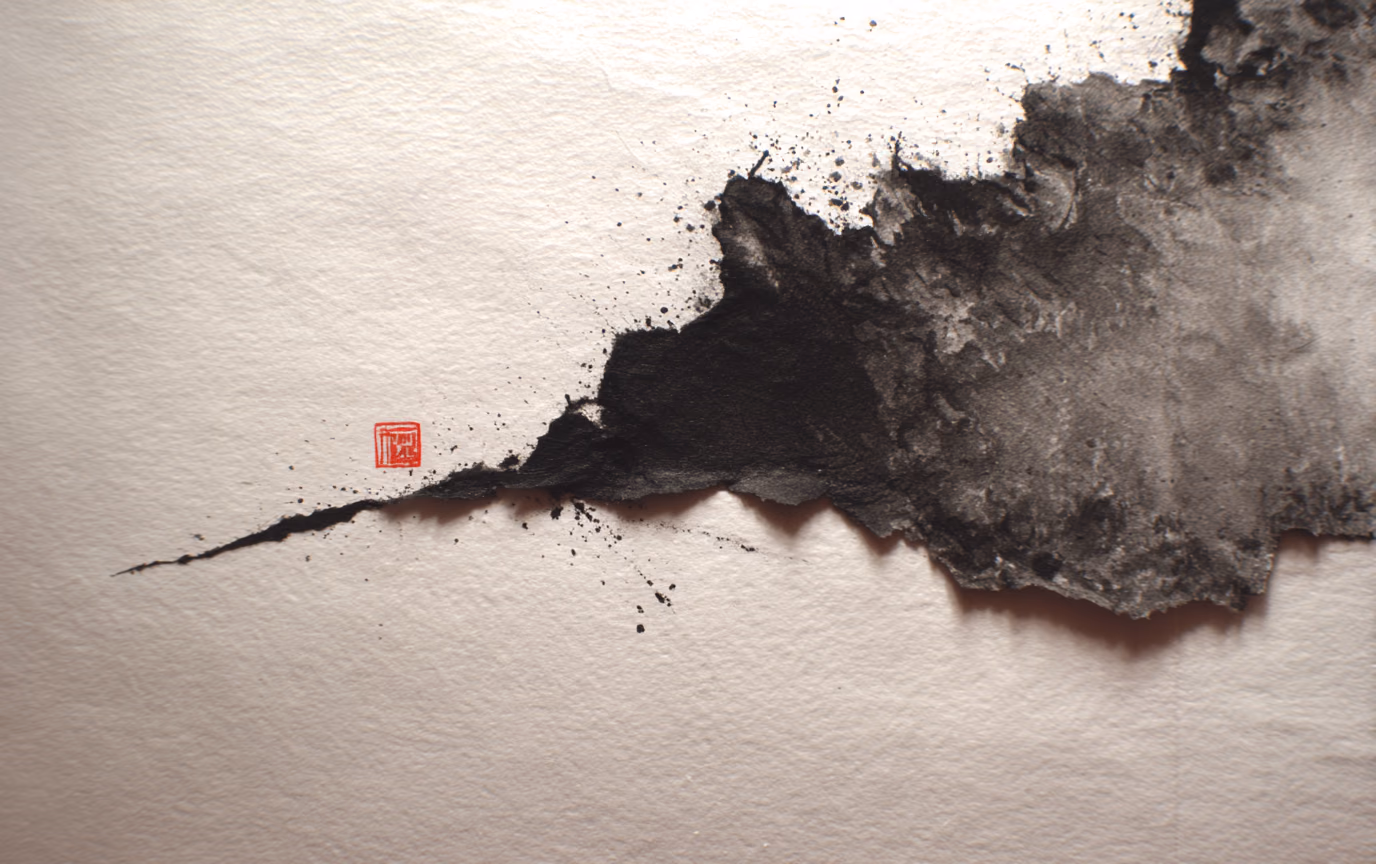 A sumi ink study on handmade paper: a single dark stroke at the left opens into a vast bleed of ink spreading across the right of the sheet, with a small red seal mark near the point where it begins.